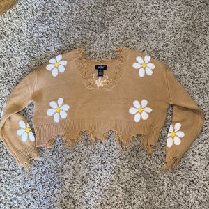 Cropped distressed sweater with retro flowers